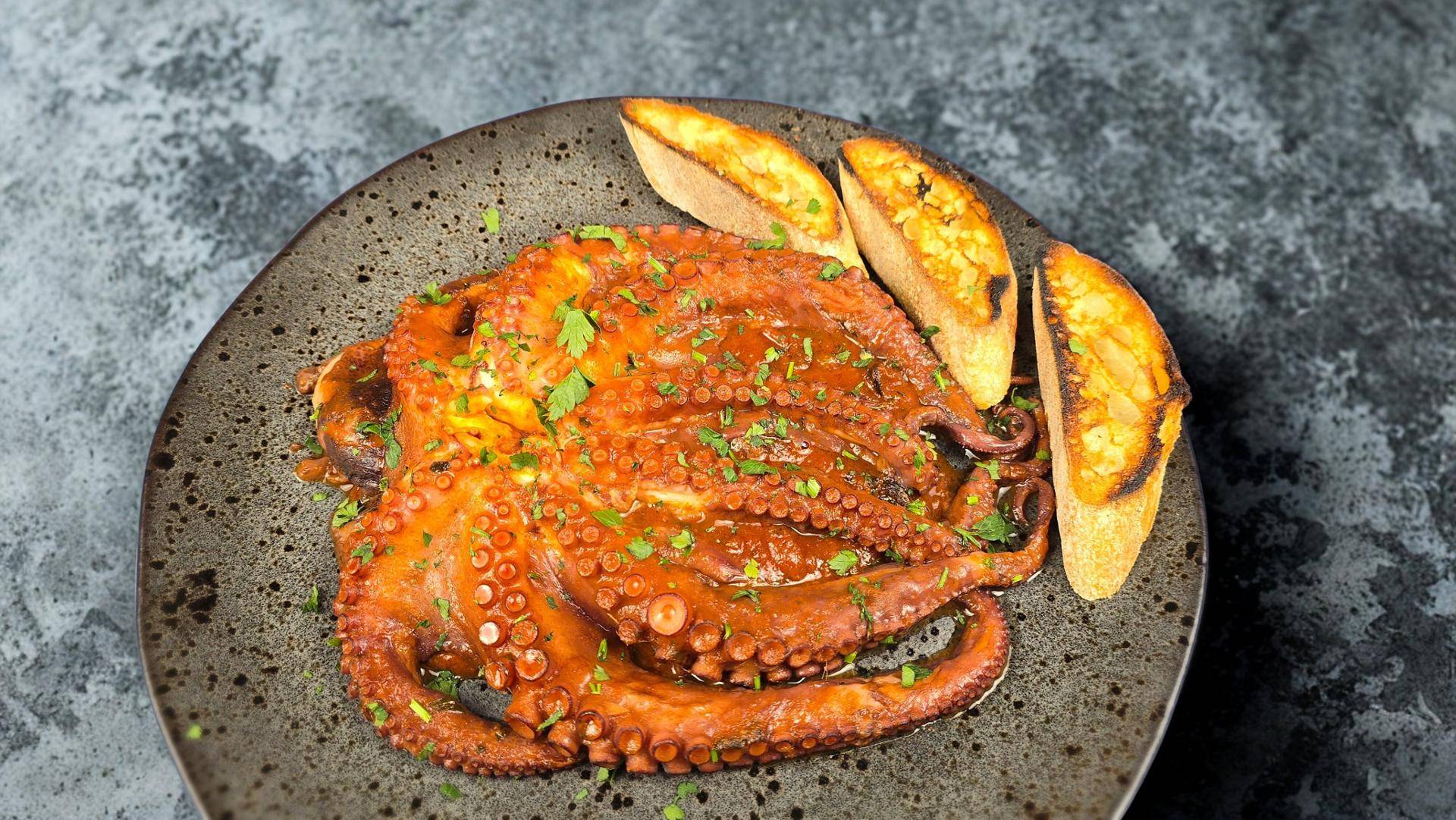 Duszona ośmiornica w pomidorach - przepisy Patelnie i Garnki | Tefal