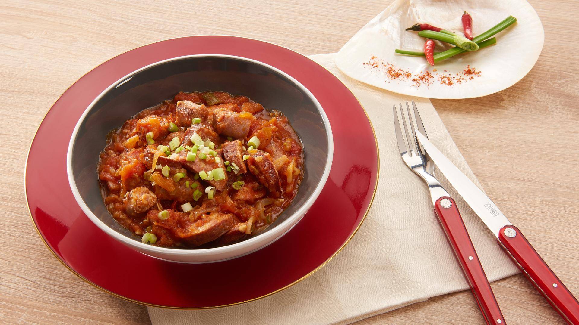 Kiełbaski w stylu Reunion - przepisy Patelnie i Garnki | Tefal